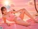 A woman in a pink bikini laying on a pink blanket on the beach.